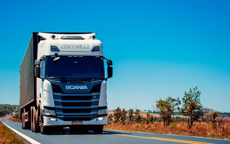 Semi-truck on the highway representing fleet operations